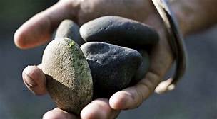 hand with stones